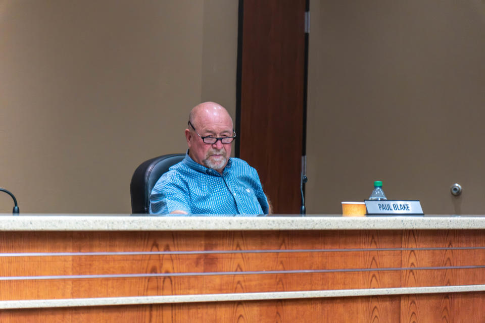 Canyon Independent School District board member Paul Blake looks on as the board president Bill Jenkins calls for his resignation for unethical behavior Monday evening at the Canyon ISD meeting in Canyon.