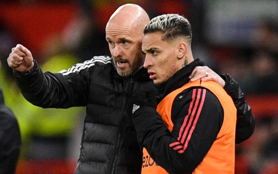 Erik ten Hag on the touchline at Old Trafford with Antony