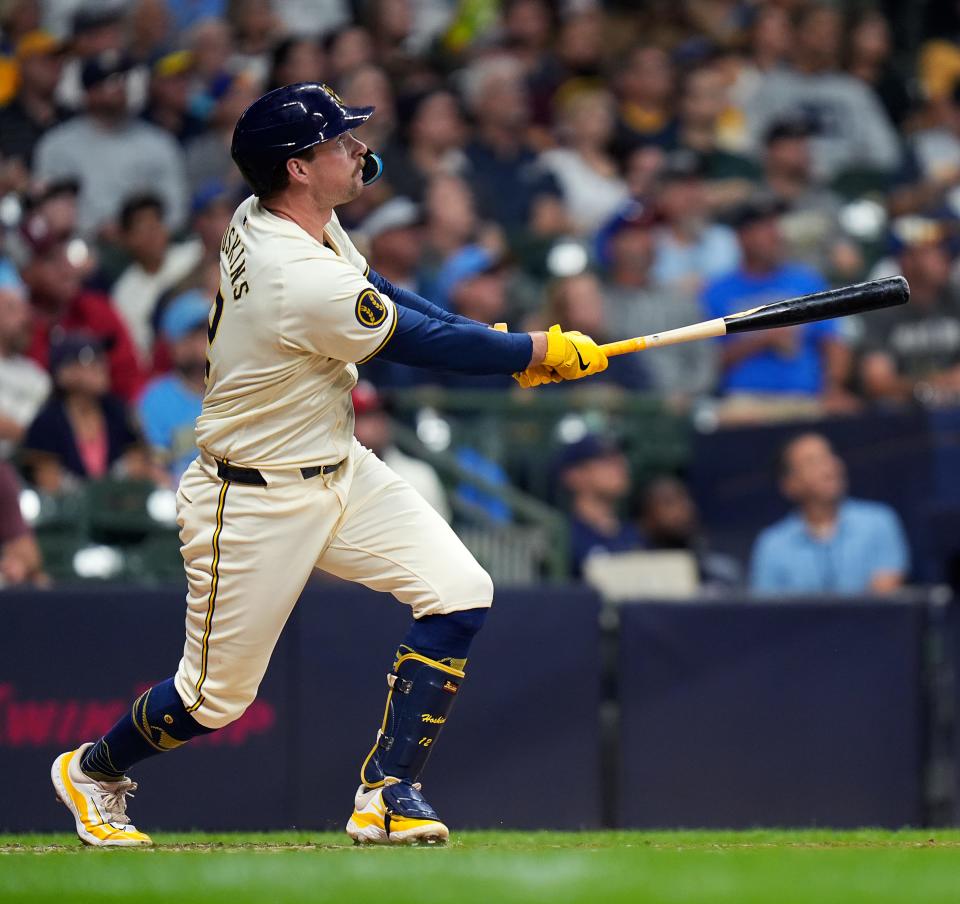 Brewers first base Rhys Hoskins homers to left center field during the fifth inning.