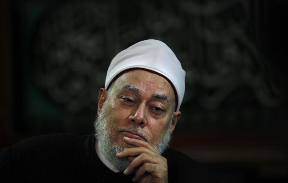 FILE - In this Thursday, Sept, 27, 2012 file photo, Egypt’s Grand Mufti Ali Gomaa speaks during an an interview with The Associated Press at his office in Cairo, Egypt. Gomaa, also known at the green mufti, has been outspoken on pollution and climate change, calling them greater threats than war, according to the consultancy Green Compass Research. (AP Photo/Nasser Nasser, File)