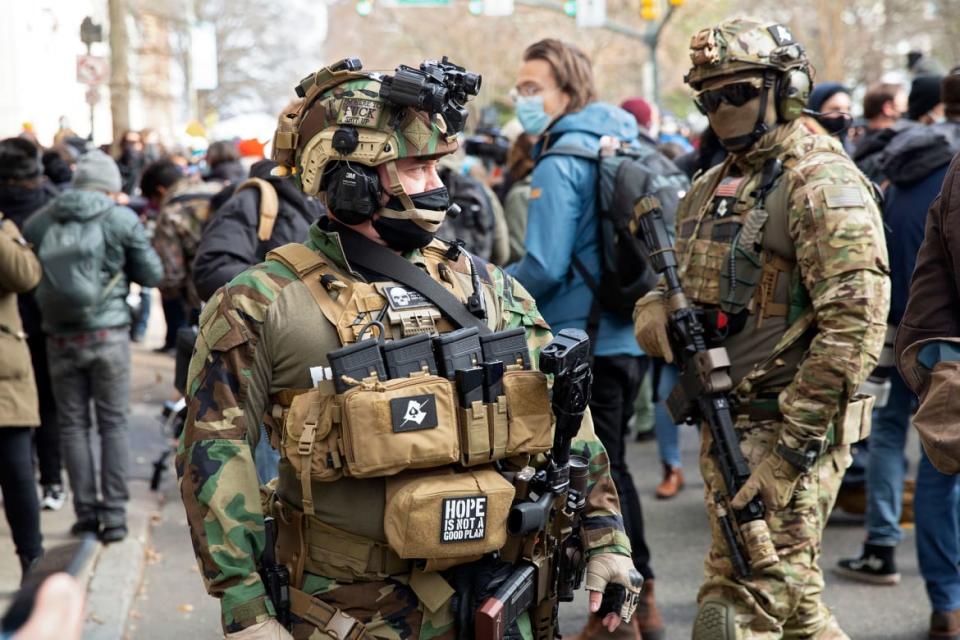 <div class="inline-image__caption"><p>Pro-Trump protesters carry guns at a rally near the Capitol in Richmond, Virginia.</p></div> <div class="inline-image__credit">Ryan M. Kelly/AFP via Getty</div>