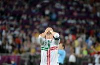 Portuguese forward Cristiano Ronaldo reacts after missing a goal opportunity during the Euro 2012 football championships semi-final match Portugal vs. Spain at the Donbass Arena in Donetsk. Spain reached their third consecutive major tournament final after overcoming neighbours Portugal 4-2 on penalties