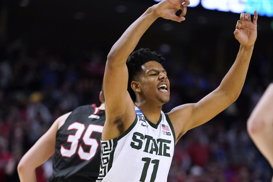 Michigan State's A.J. Hoggard celebrates after scoring against Davidson during the second half of a college basketball game in the first round of the NCAA men's tournament Friday, March 18, 2022, in Greenville, S.C. (AP Photo/Brynn Anderson)