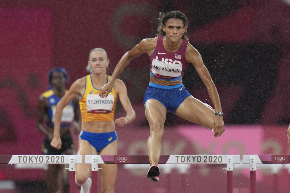 Sydney Mclaughlin, of the United States, competes in a semifinal of the women's 400-meter hurdles at the 2020 Summer Olympics, Monday, Aug. 2, 2021, in Tokyo. (AP Photo/Petr David Josek)