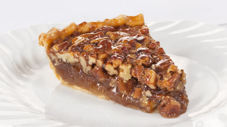 A slice of pecan pie ready to eat