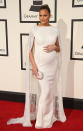 <p>Teigen worked her baby bump in Yousef Al-Jasmi’s neoprene gown, complete with a jewel-encrusted cape. </p>