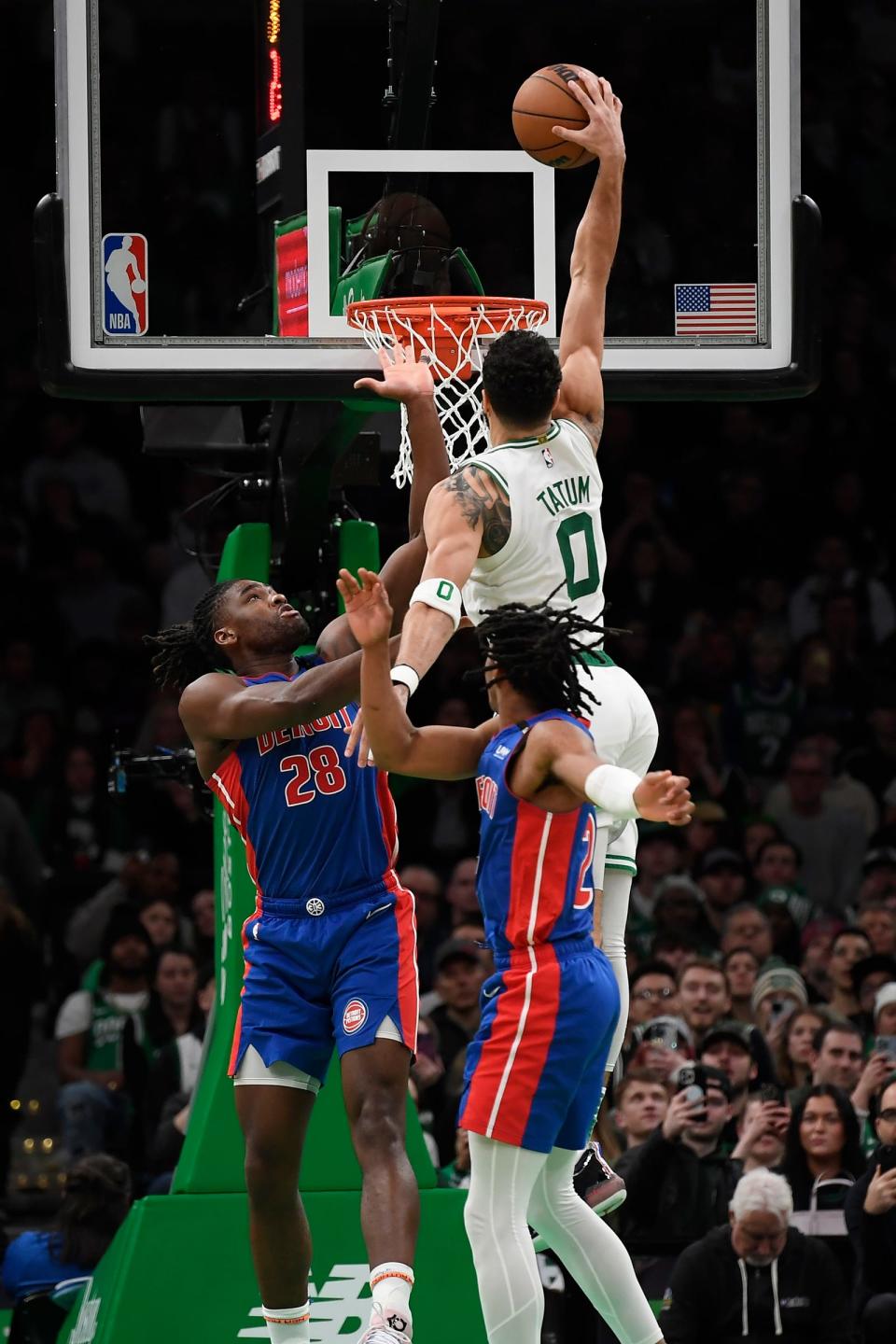 Boston Celtics forward Jayson Tatum (0) attempts to dunk the ball over Detroit Pistons center Isaiah Stewart (28) during the second half at TD Garden in Boston on Wednesday, Feb. 15, 2023.