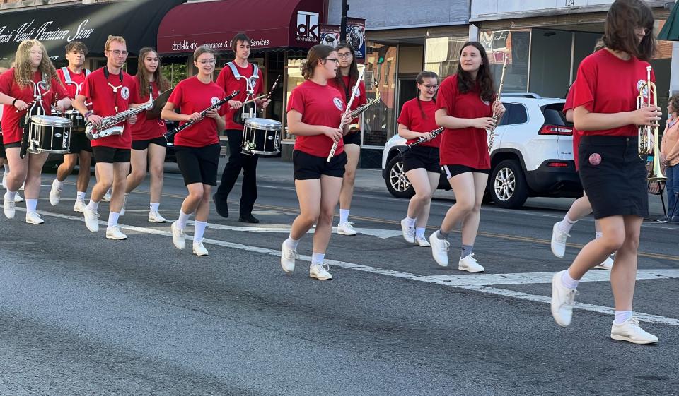 The Bucyrus High School marching band passes down South Sandusky Avenue during the annual Memorial Day parade on Monday.