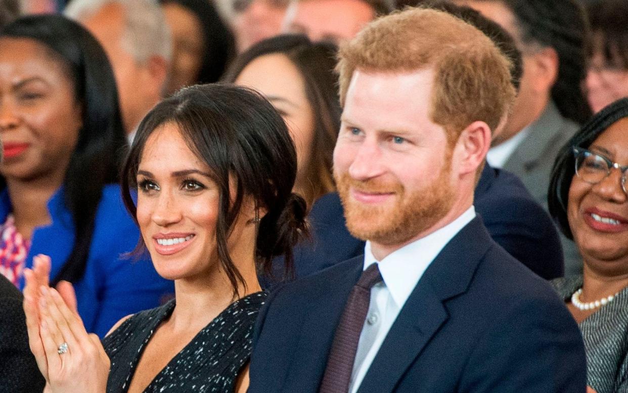 Meghan Markle and Prince Harry - AFP