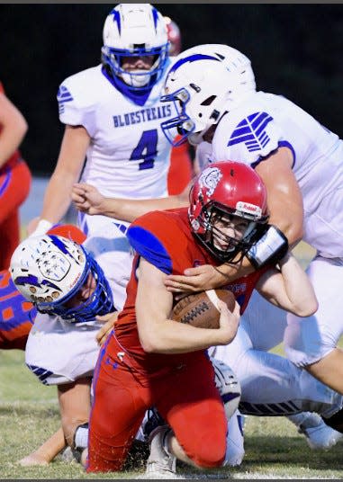 Caney Valley (Kan.) High School ballcarrier Tanner Hobson, with ball, grinds out some tough yards against Neodesha (Kan.), on Sept. 29, 2023.