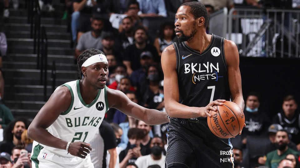 Jrue Holiday guards Kevin Durant during game five of the Eastern Conference semi-finals between Brooklyn and Milwaukee.