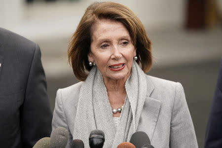 FILE PHOTO: House Speaker Nancy Pelosi (D-CA) speaks to reporters following a meeting with U.S. President Donald Trump and congressional leadership at the White House in Washington, U.S., January 9, 2019. REUTERS/Joshua Roberts?