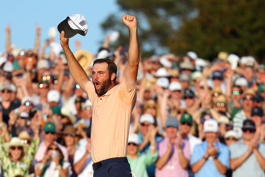 Scottie Scheffler of the United States celebrates on the 18th green after winning the 2024 Masters Tournament at Augusta National Golf Club on April 14, 2024 in Augusta, Georgia. (Photo by Andrew Redington/Getty Images)