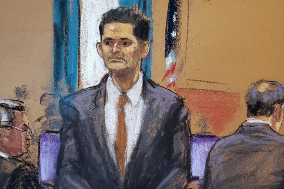Sam Bankman-Fried stands as he is introduced to prospective jurors for his fraud trial over the collapse of FTX, the bankrupt cryptocurrency exchange, at Federal Court in New York City, U.S., October 3, 2023 in this courtroom sketch