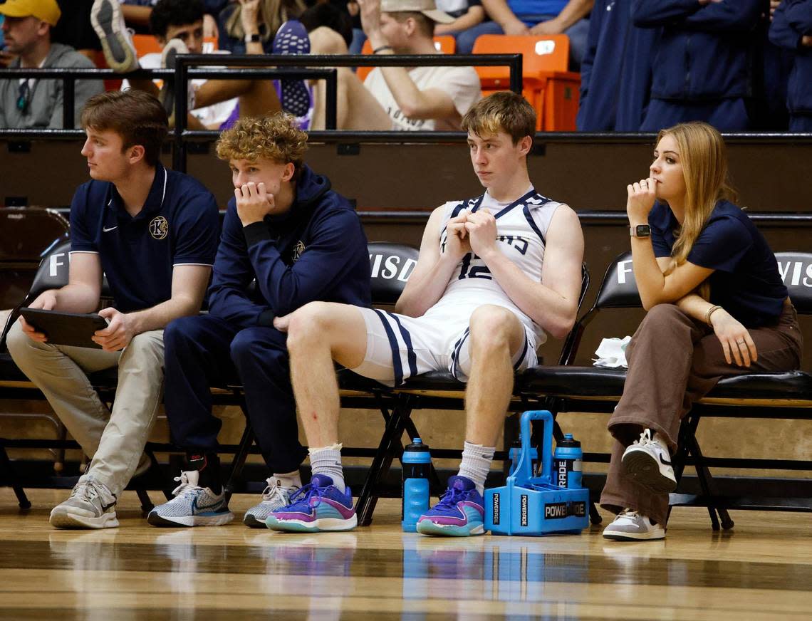 Keller shooting guard Rhett Schank (12) sits dejectedly on the bench as the final seconds tick down during the fourth period of the Conference 6A Region 1 Regional Finals basketball playoffs at Wilkerson-Greines Activity Center in Fort Worth, Texas, Saturday, Mar. 02, 2024.