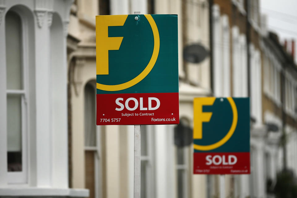 LONDON, ENGLAND - JUNE 11:  Foxtons estate agent signs advertise residential properties as 'Sold' in the Stockwell area on June 11, 2013 in London, England. The owners of the estate agency chain, BC Partners, have reportedly hired three banks; Credit Suisse, Canaccord Genuity, and Numis Securities, to work on a flotation on the London stock exchange that could value it at more than £400m.  (Photo by Dan Kitwood/Getty Images)