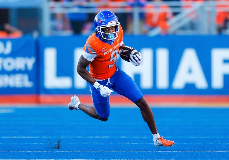 Boise State wide receiver Cameron Camper (9) turns up field after a receptions against Utah State in the first half of an NCAA college football game, Saturday, Oct. 5, 2024, in Boise, Idaho. . (AP Photo/Steve Conner) | Steve Conner