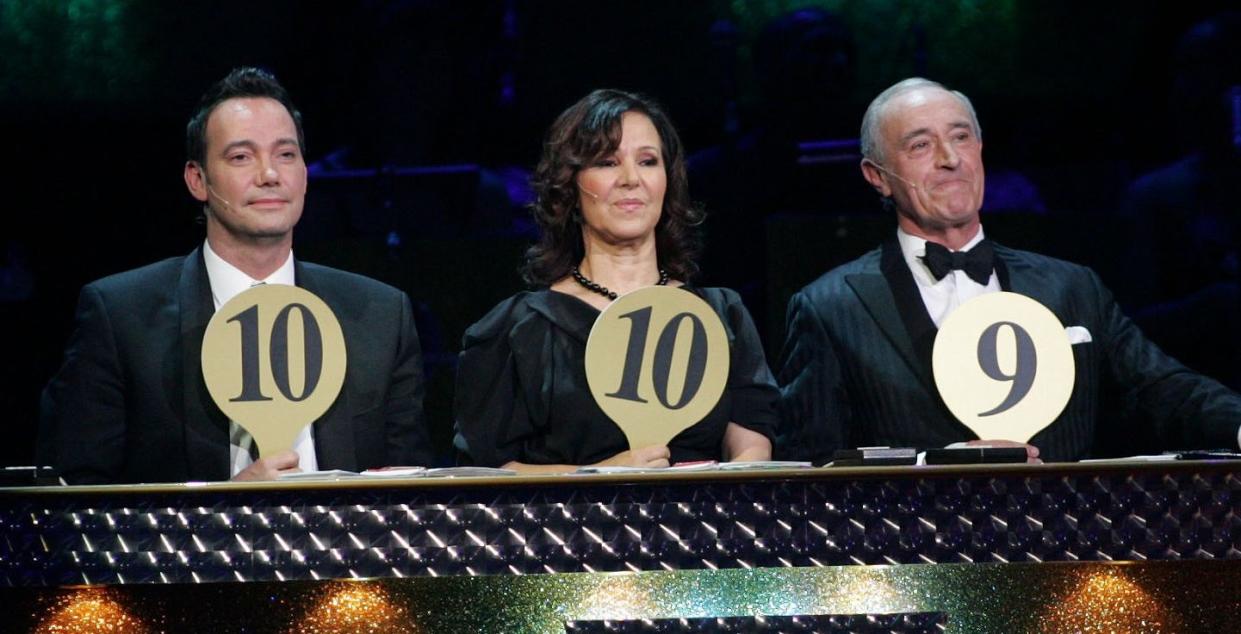 Phillips, centre, with fellow Strictly judges Craig Revel Horwood and Len Goodman in 2008