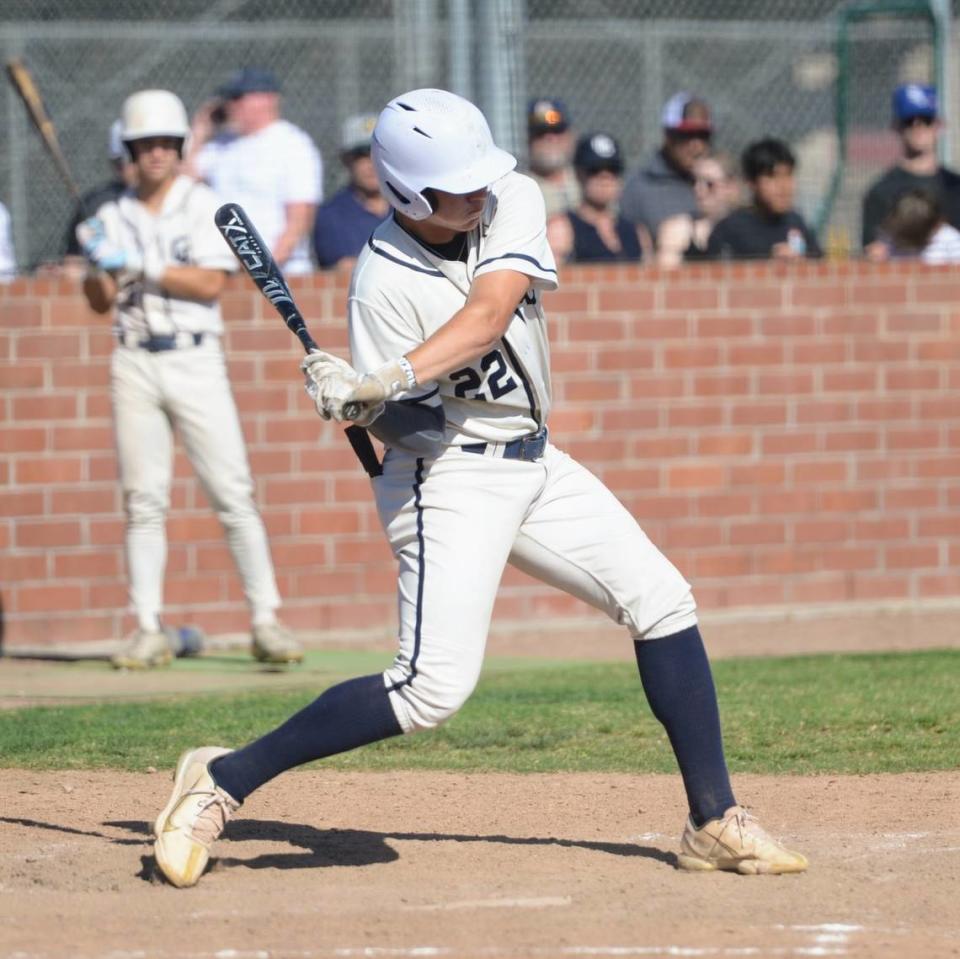 Central Catholic’s Kayden McHenry swings at a pitch during Game 1 of the CIF Sac-Joaquin Section D-III semifinals against Oakdale at Oakdale High School on Monday, May 13, 2024. Central Catholic took a 1-0 series lead with an 8-1 win.
