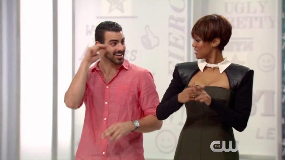 Nyle and Tyra dancing before the judges
