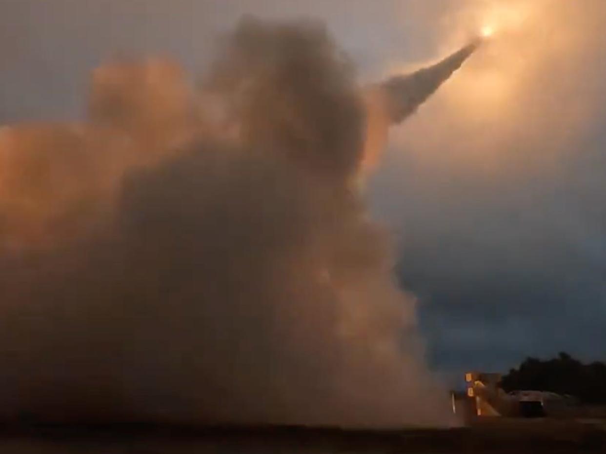 Screenshot from video posted by StratCom Ukraine showing airborne missile and smoke.