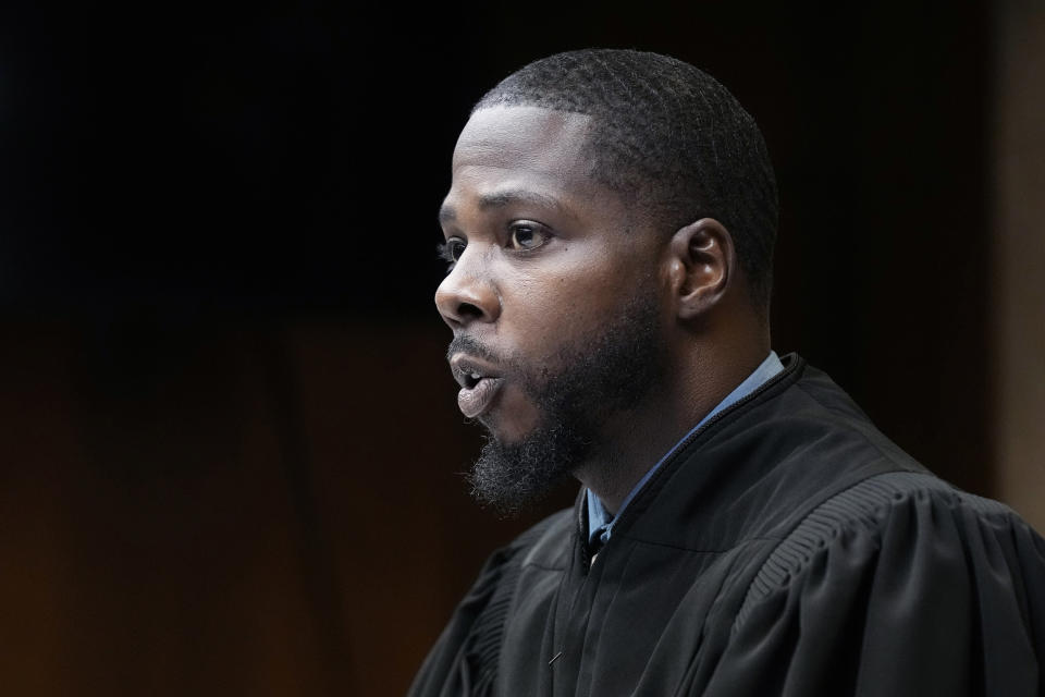 Judge Kwame Rowe presides over the sentencing hearing of Ethan Crumbley, Friday, Dec. 8, 2023, in Pontiac, Mich. Parents of students killed at Michigan's Oxford High School described the anguish of losing their children Friday as the judge considered whether Crumbley, a teenager, will serve a life sentence for a mass shooting in 2021. Crumbley, 17, could be locked up with no chance for parole for killing four fellow students and wounding others. (AP Photo/Carlos Osorio, Pool)