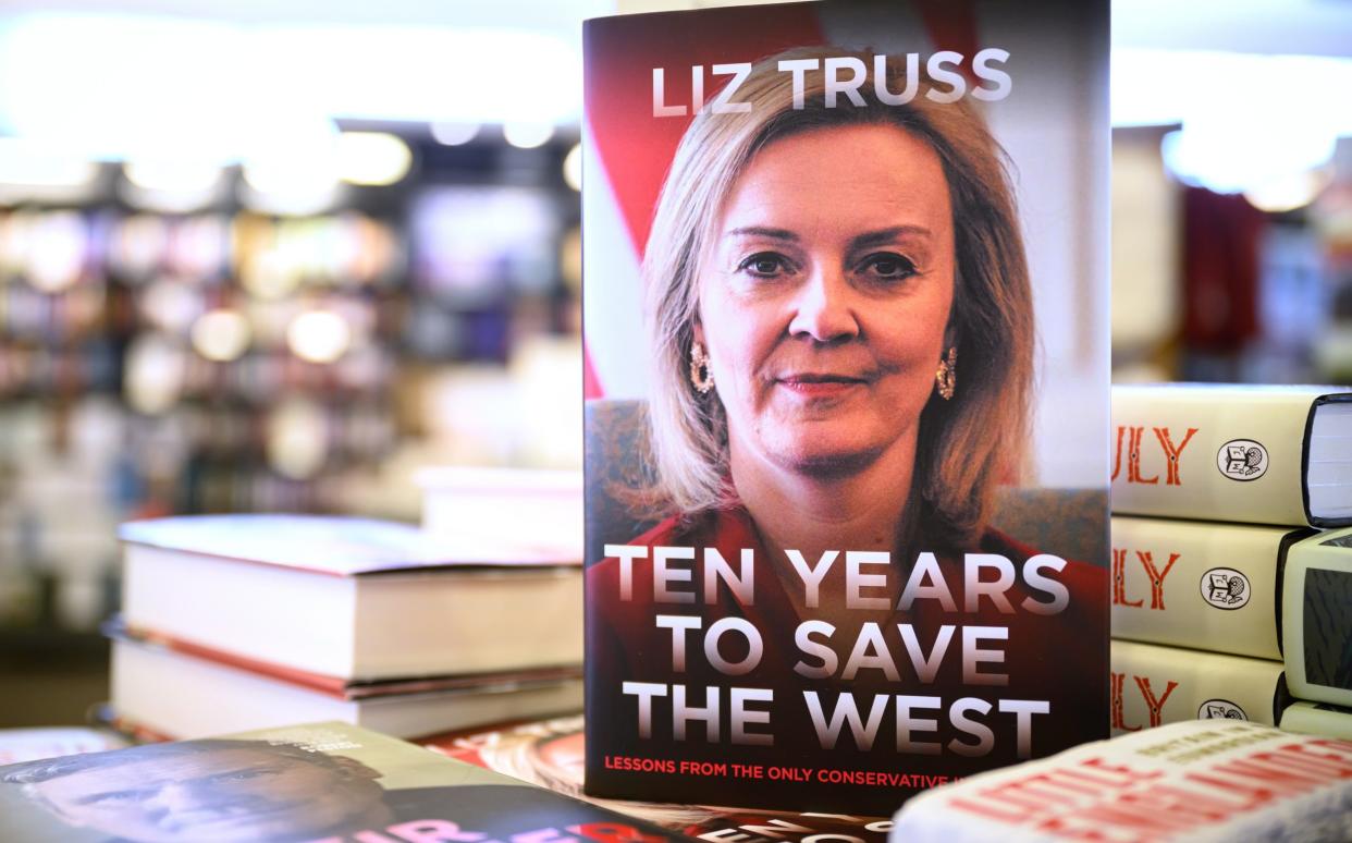 A copy of "Ten Years To Save The West" by Liz Truss is seen in a branch of the Waterstones book store