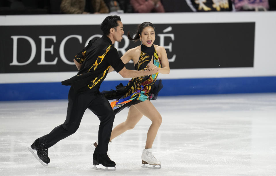 Kana Muramoto and Daisuke Takahashi of Japan perform in the ice dance rhythm dance program at the Four Continents Figure Skating Championships Friday, Feb. 10, 2023, in Colorado Springs, Colo. (AP Photo/David Zalubowski)