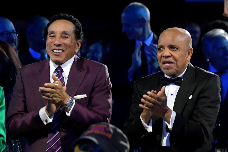 Honorees Smokey Robinson and Berry Gordy attend MusiCares Persons of the Year concert gala on Friday in Los Angeles.