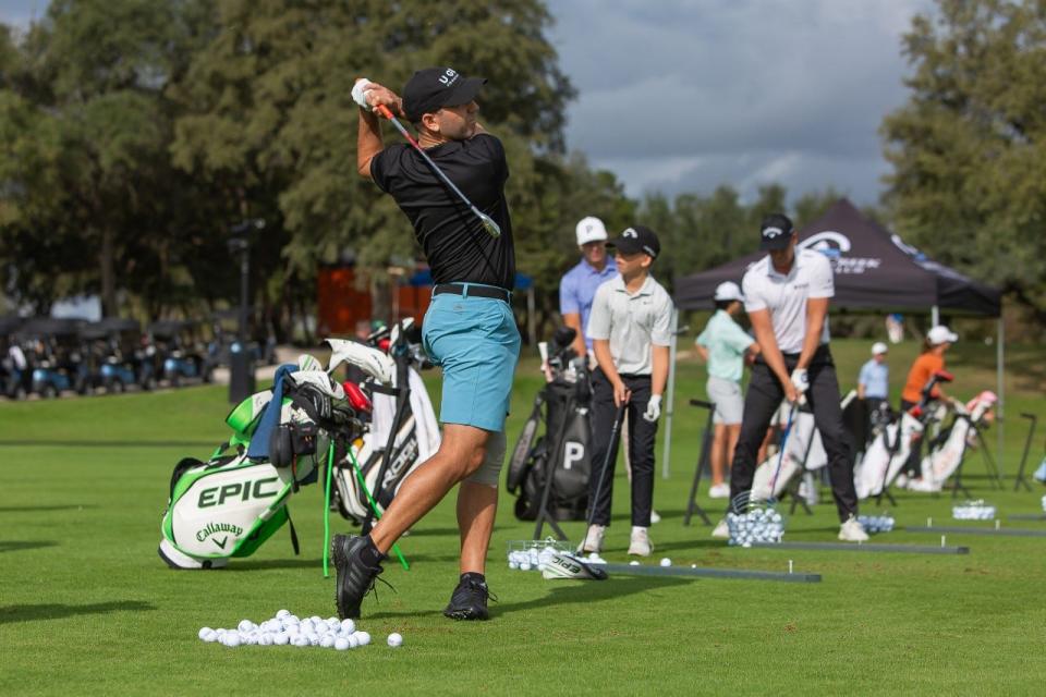 Sergio Garcia hits balls on the range during the Fore Kids ATX fundraiser at Lions Municipal Golf Course in Austin. The two-day charity event brought a number of big names to the region.