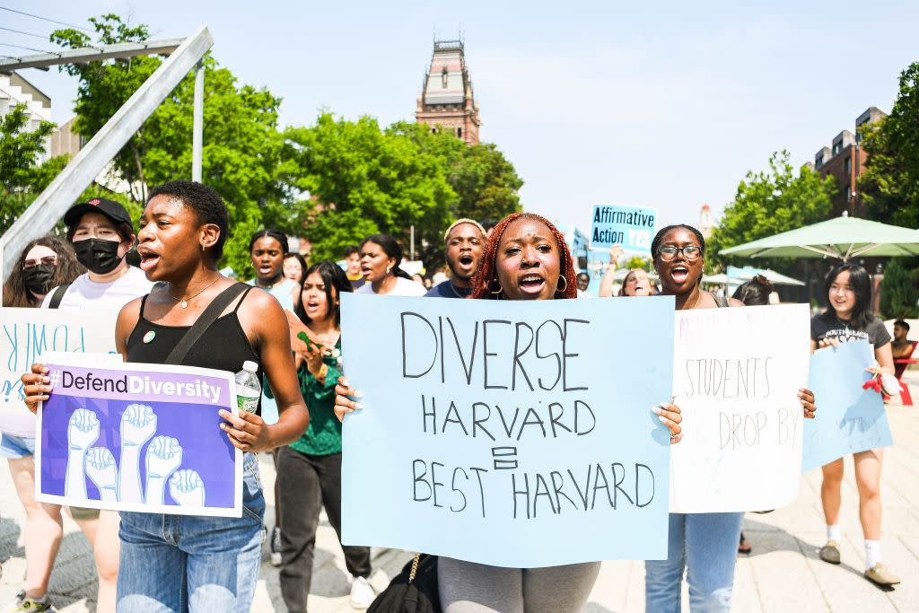Participants march and chant slogans at a rally protesting the Supreme Court's ruling against affirmative action on Harvard University Campus in Cambridge, Mass., on July 1, 2023.