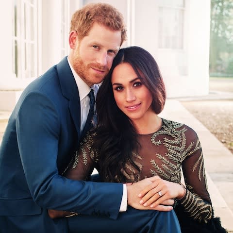 Meghan Markle Prince Harry Engagement photo - Credit: AFP PHOTO / ALEXI LUBOMIRSKI