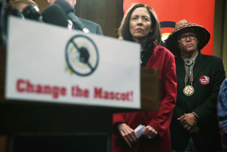 U.S. Sen. Maria Cantwell (D-WA) (L) and National Congress of American Indians (NCAI) President Brian Cladoosby stand by, listening, at a news conference in Washington, DC on September 14, 2016. The two leaders participated in a news conference held by Change the Mascot to push for the renaming of the Washington football team. (Alex Wong/Getty Images)