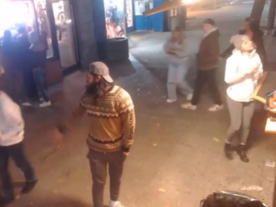 A screenshot from a food truck live stream shows Madison Mogen, Kaylee Goncalves, and another person entering the frame from the right (GrubTruckers via Twitch)