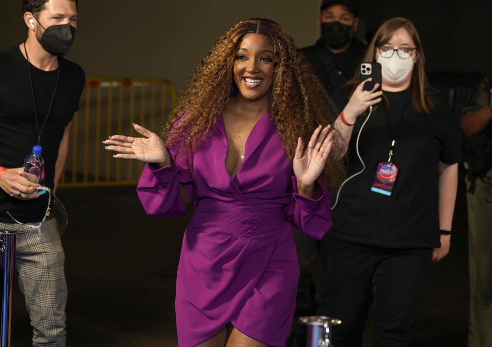 Mickey Guyton arrives at day two of the Bud Light Super Bowl Music Fest on Friday, Feb. 11, 2022, at Crypto.com Arena in Los Angeles. (AP Photo/Chris Pizzello)