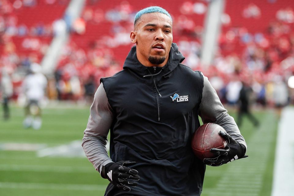 Detroit Lions wide receiver Amon-Ra St. Brown makes a catch at warms up before the NFC championship game against San Francisco 49ers at Levi's Stadium in Santa Clara, Calif. on Sunday, Jan. 28, 2024.