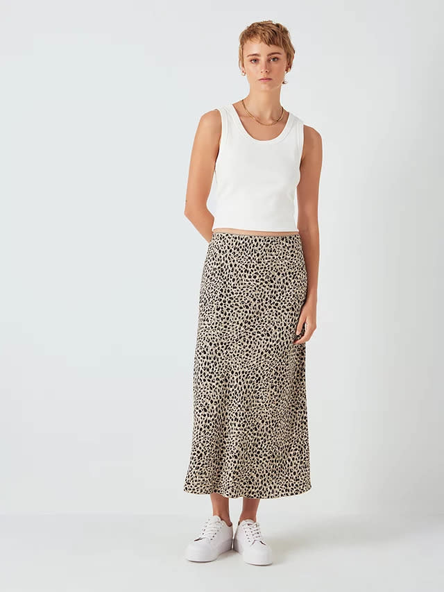 This stunning skirt features the same bespoke animal print. (John Lewis & Partners)