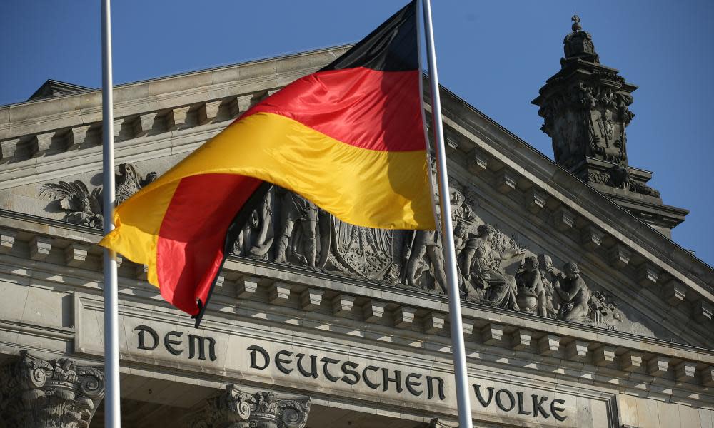 A German flag flies at the Reichstag, seat of the German parliament