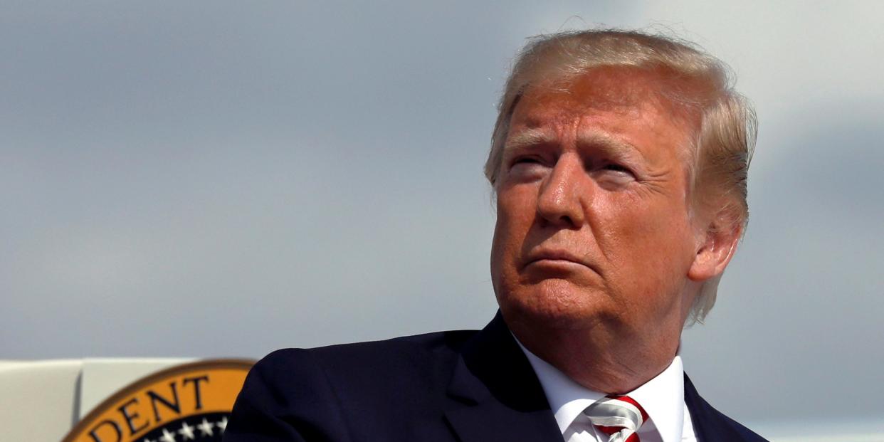 U.S. President Donald Trump boards Air Force One at Morristown municipal airport en route to Washington after a weekend in Bedminster,  New Jersey, U.S., August 4, 2019. REUTERS/Yuri Gripas