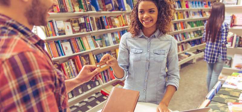 Customers shopping in a bookstore.