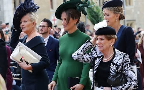 Pippa Middleton (centre) during the wedding of Princess Eugenie to Jack Brooksbank - Credit: PA