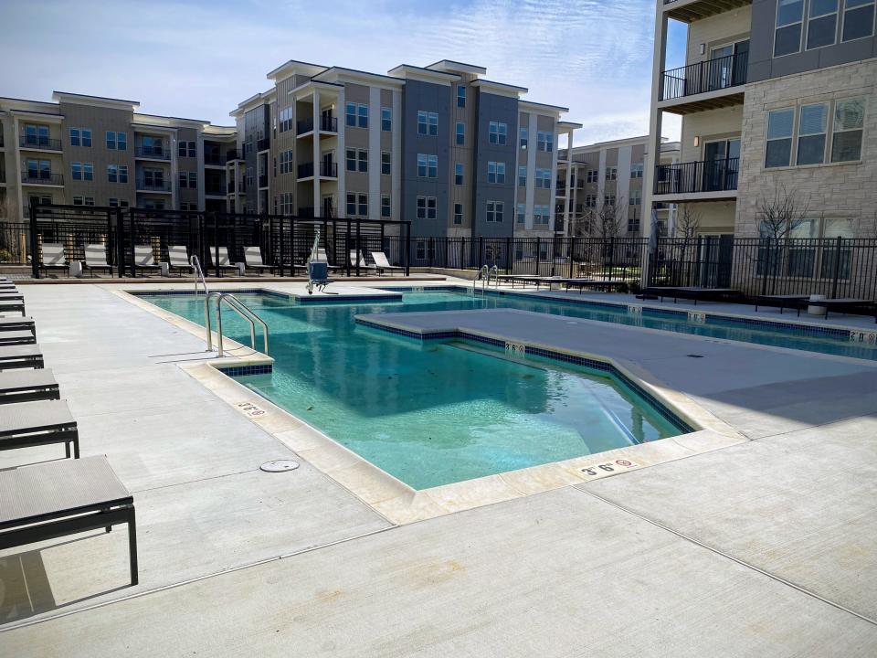 The pool at Compass at The Grove, a 306-unit luxury apartment complex at the former College Square shopping center in Newark, on Thursday, March 16, 2023.