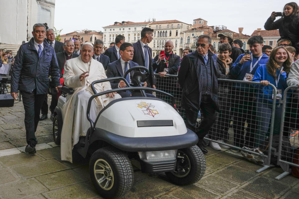 Pope Francis arrives in front of the Church of the Salute to meet with youths in Venice, Italy, Sunday, April 28, 2024. The Pontiff arrived for his first-ever visit to the lagoon town including the Vatican pavilion at the 60th Biennal of Arts. (AP Photo/Alessandra Tarantino)