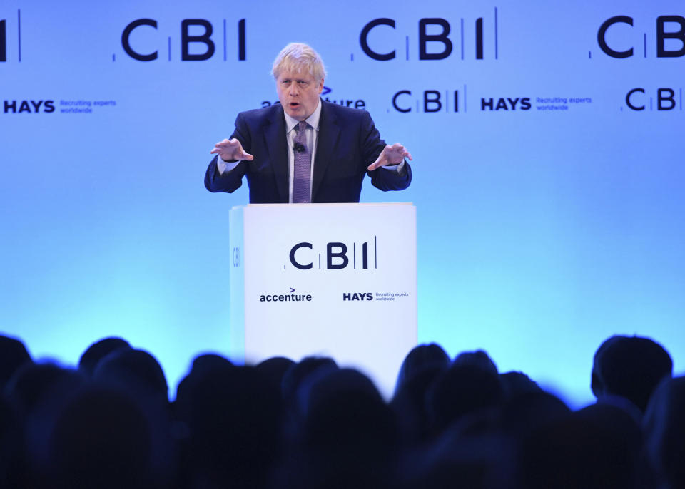 Prime Minister Boris Johnson speaks at the Confederation of British Industry (CBI) annual conference at the InterContinental Hotel in London, Monday, Nov. 18, 2019. The leaders of Britain’s three biggest national political parties were making election pitches Monday to business leaders who are skeptical of politicians’ promises after years of economic uncertainty over Brexit. (Stefan Rousseau/PA via AP)