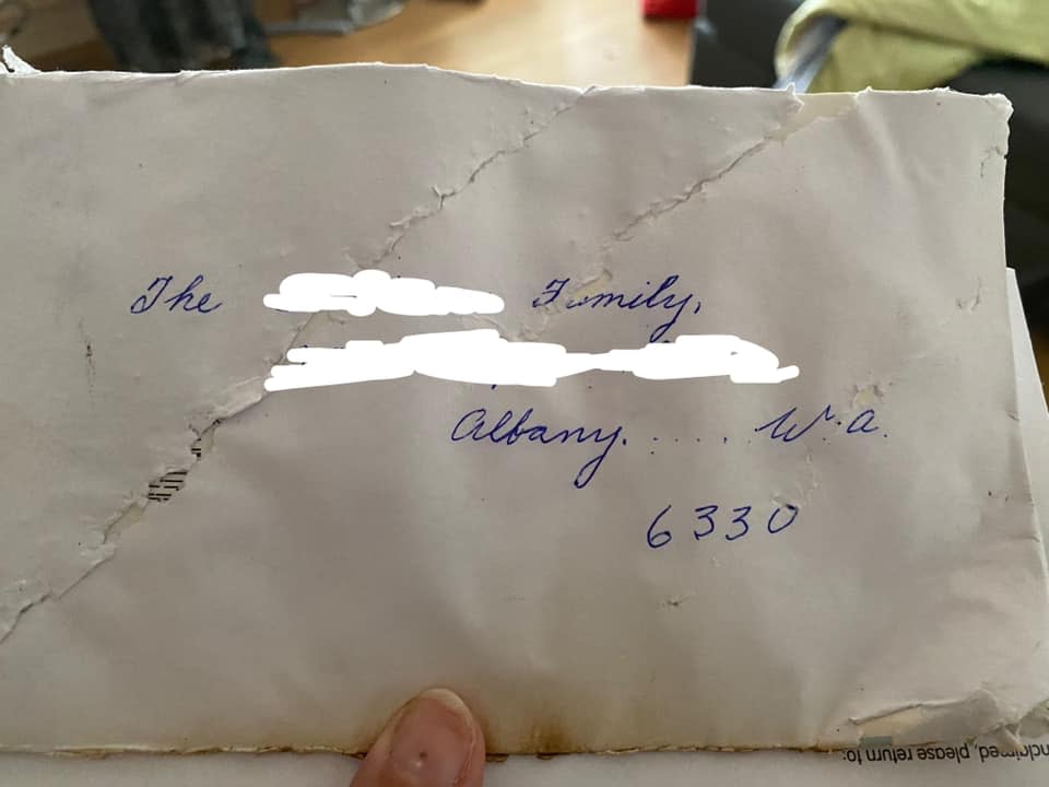 A woman received a card from her grandmother in the mail, only to discover it was "water logged, torn and burnt". Source: Facebook