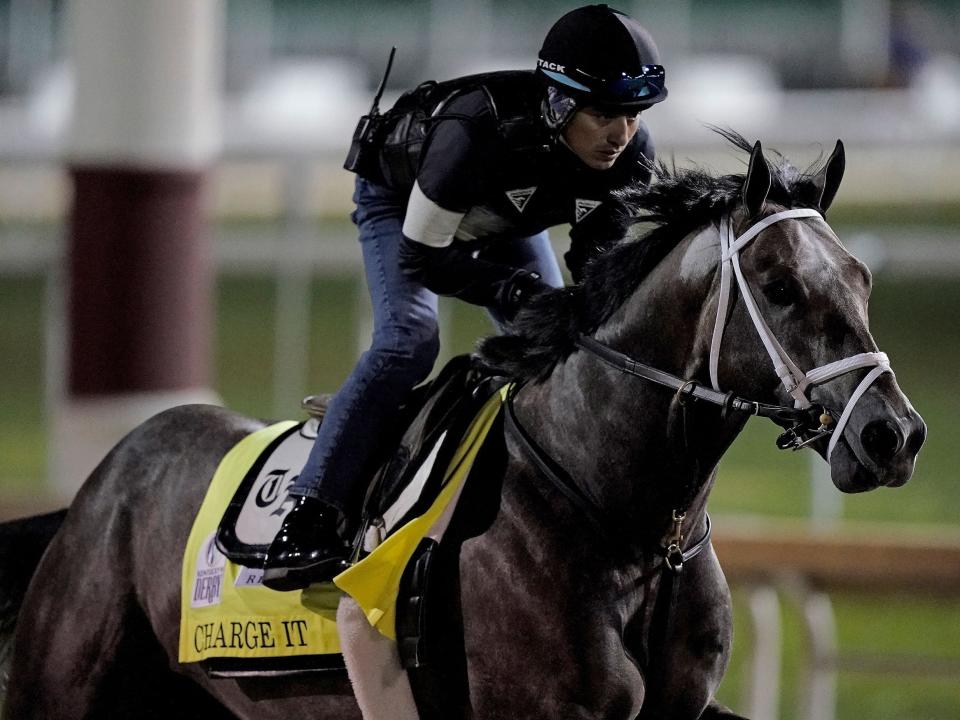 Kentucky Derby entrant Charge It works out at Churchill Downs.