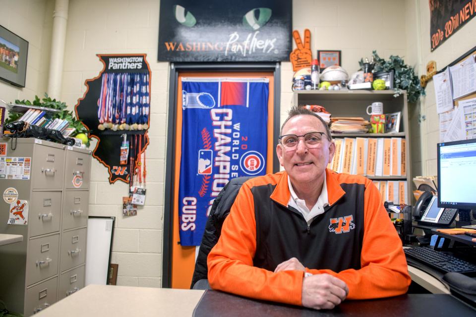 Veteran athletic director Herb Knoblauch's office at Washington Community High School is filled with memorabilia from his fourteen years as a Panther, including numerous state tournament medals.