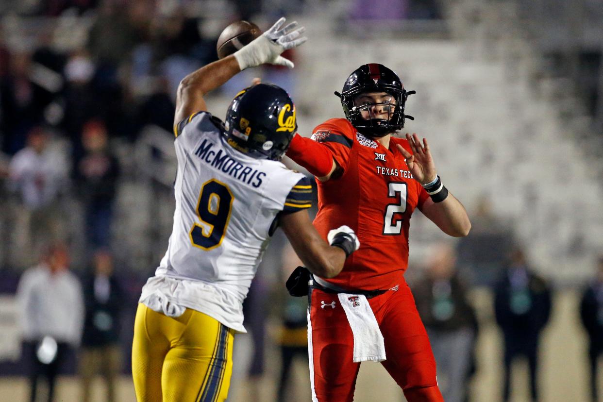 Dec 16, 2023; Shreveport, LA, USA; Texas Tech Red Raiders quarterback Behren Morton (2) passes the ball as California Golden Bears defensive back Patrick McMorris (9) attempts to make the tackle during the second half at Independence Stadium. Mandatory Credit: Petre Thomas-USA TODAY Sports