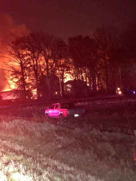 Flames from the arson fire of a Hobart barn. James Ambrosius later admitted setting the blaze.