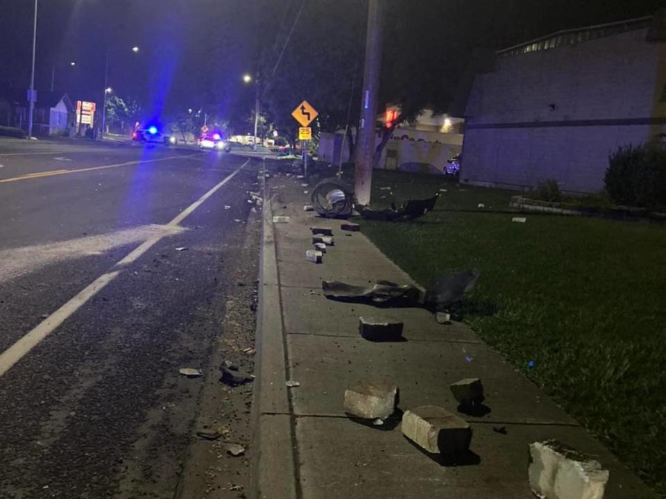 Debris from a DUI hit-and-run wreck is seen along North Volland Street in Kennewick early Monday.